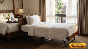 Giường extra bed khách sạn cao cấp được vệ sinh sạch sẽ và trải ga trắng tinh tươm