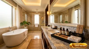 Không gian phòng tắm khách sạn 5 sao sang trọng với bồn tắm và thiết bị cao cấp
